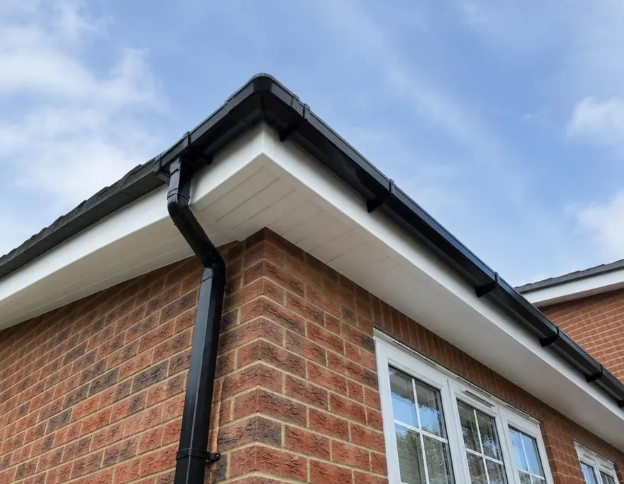 Bright white fascia boards and soffits beneath a roof edge